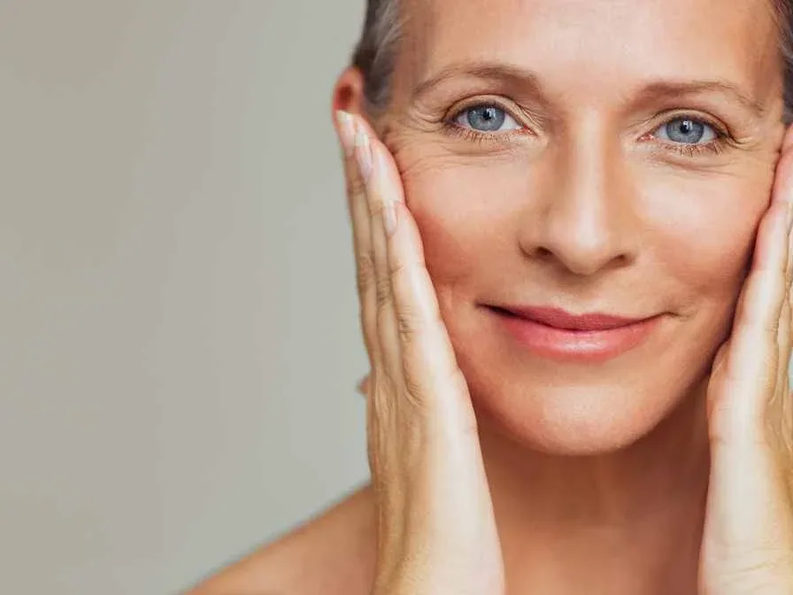 A happy woman after her natural facial treatment, Kobido massage in Nice